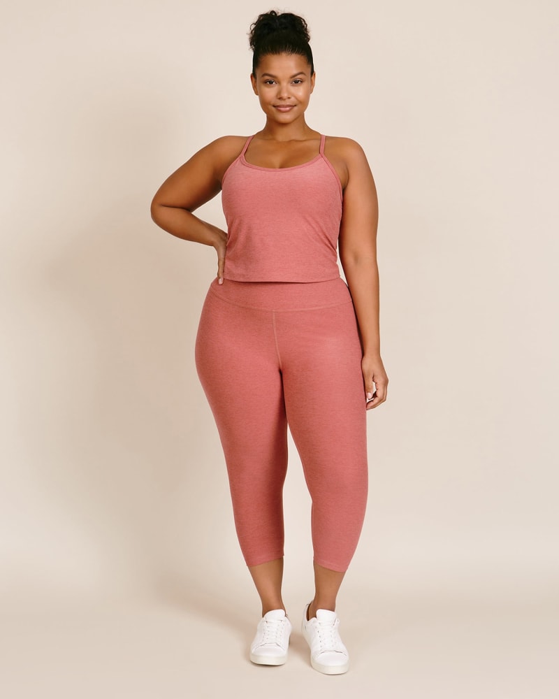Front of a model wearing a size 1X Walk and Talk High Waisted Capri Legging in Softest Scarlet by Beyond Yoga. | dia_product_style_image_id:225713